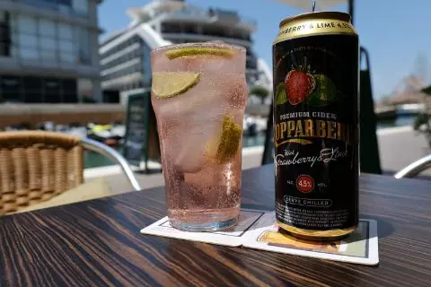 A pint of Kopparberg with ice and lime